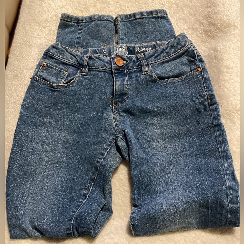 Girls size 12 SO skinny jeans with adjustable waist.